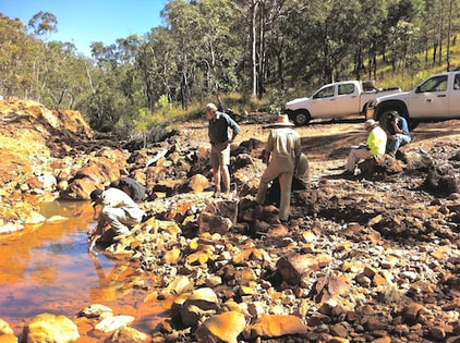 Mbabaram Traditional Owners testing water at Anniversary Mine near Herberton